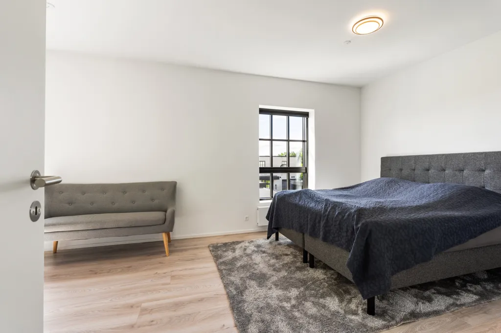 Magamistoad - Modern Rowhouse with South-Facing Garden in Paderup