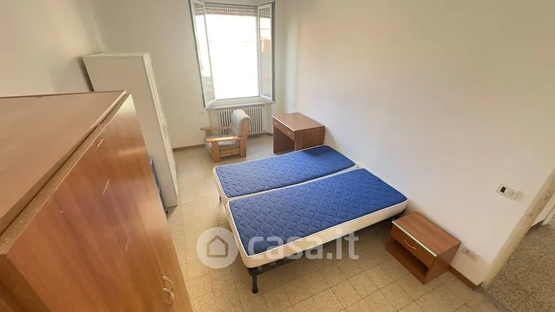 Chambres - Four-Bedroom Apartment with High Ceilings in Parma