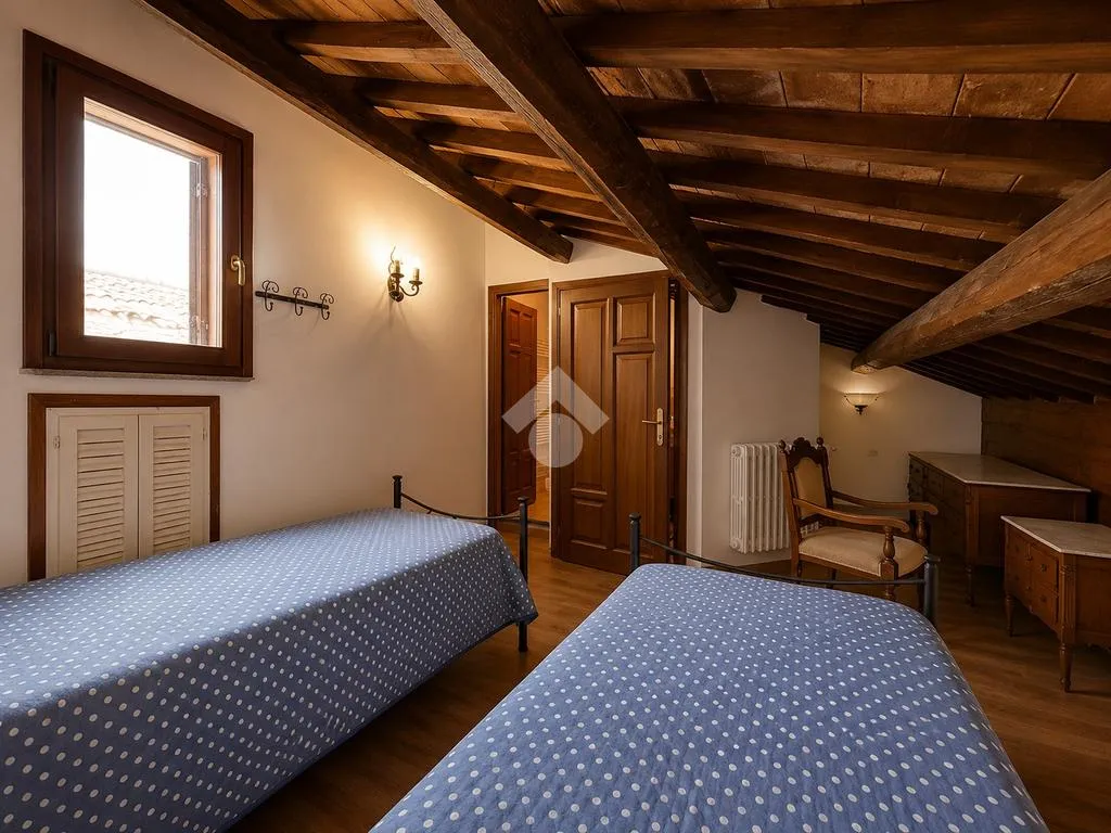Camere da letto - Historic Apartments with Piazza View in Bagnaia