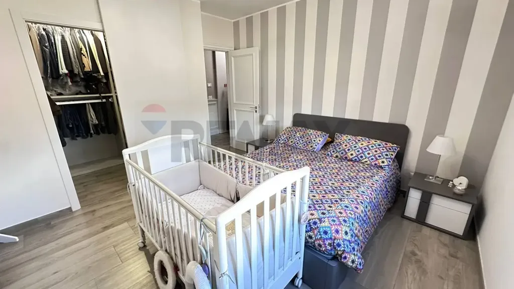 Bedrooms - Modern Apartment with Balcony in Cosenza
