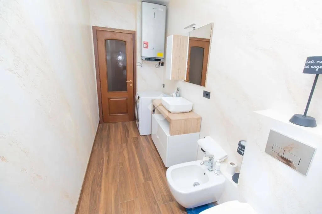 Salles de bain - Refurbished Apartment with Balcony in Leini