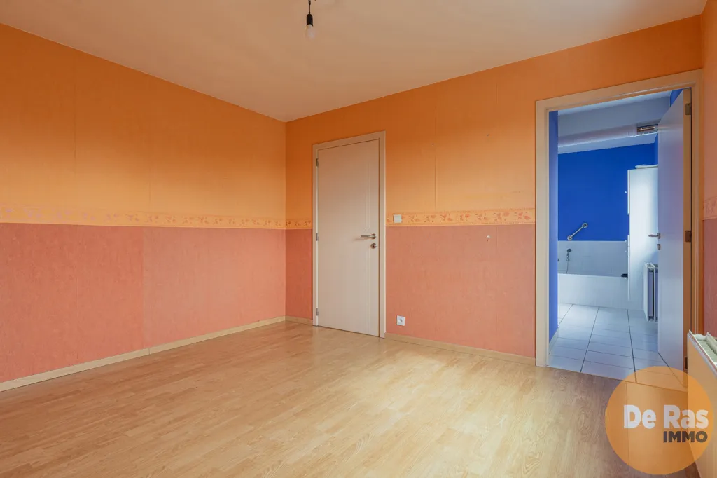 Chambres - Appartement avec Vue sur la Place du Marché à Herzele