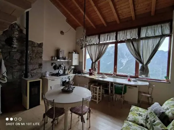 Terraced House with Wood Features in Cimbergo