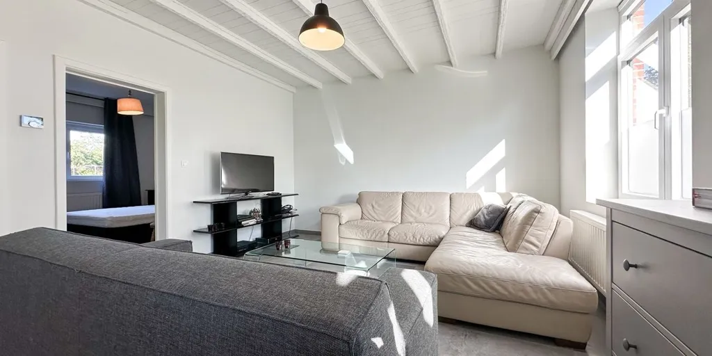 Séjour - Appartement Charmant avec Garage à Heusden
