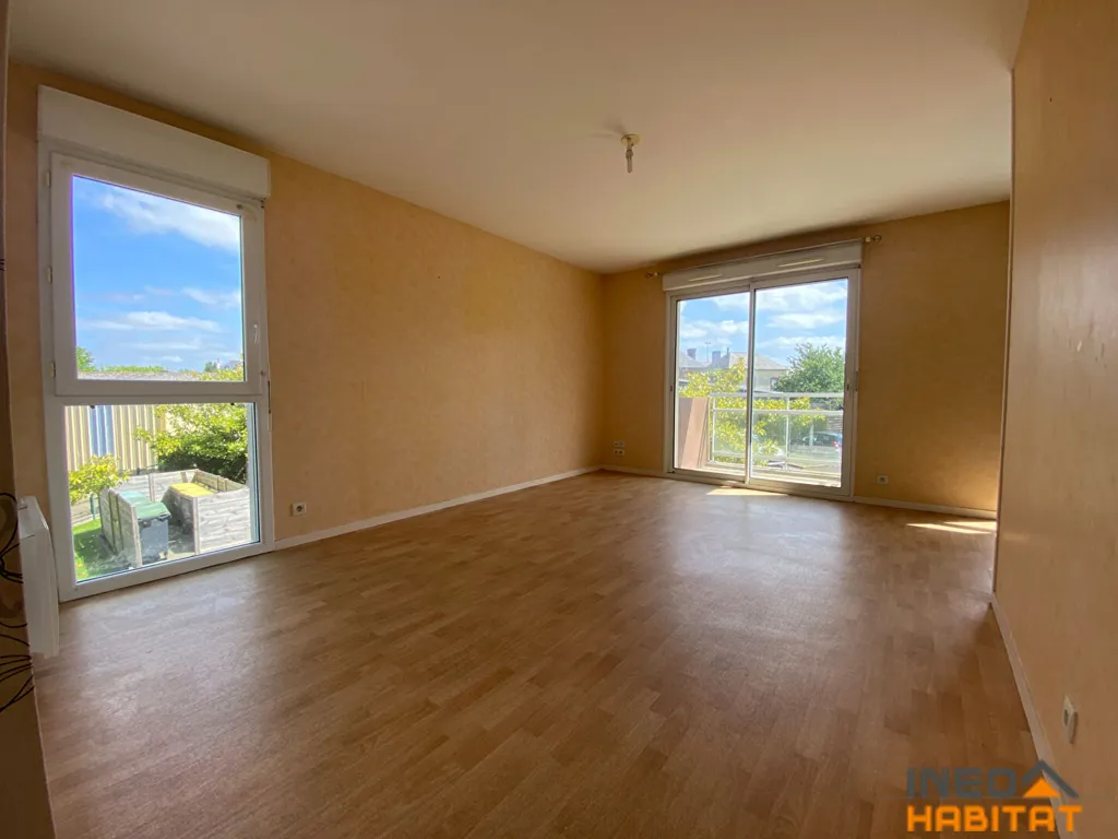 Séjour - Appartement en centre-ville d'Irodouër avec balcon