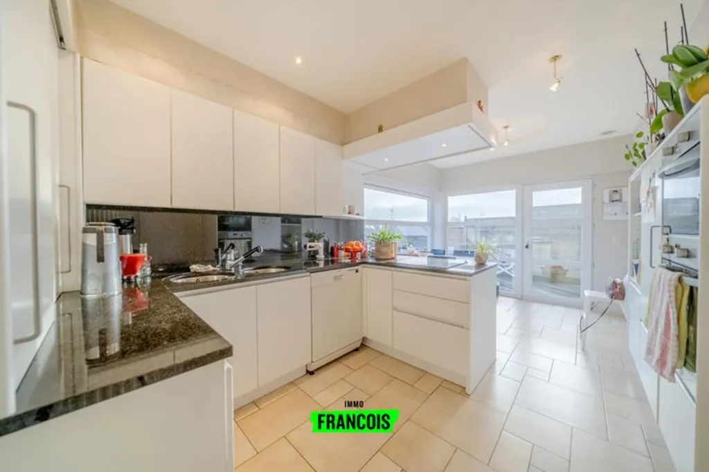 Cuisine - Appartement avec Terrasse Spacieuse à Boezinge