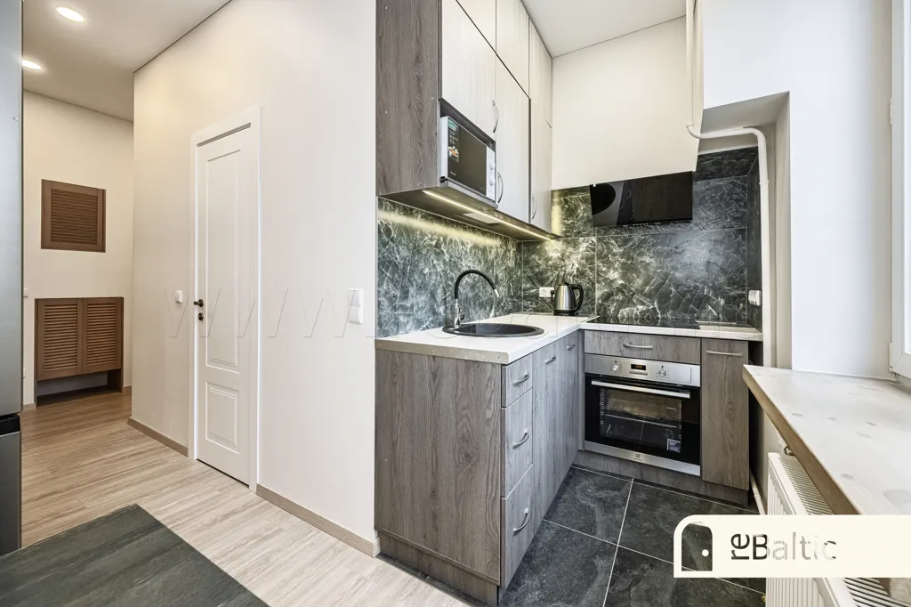 Cuisine - Renovated Apartment with Garden in Šnipiškės