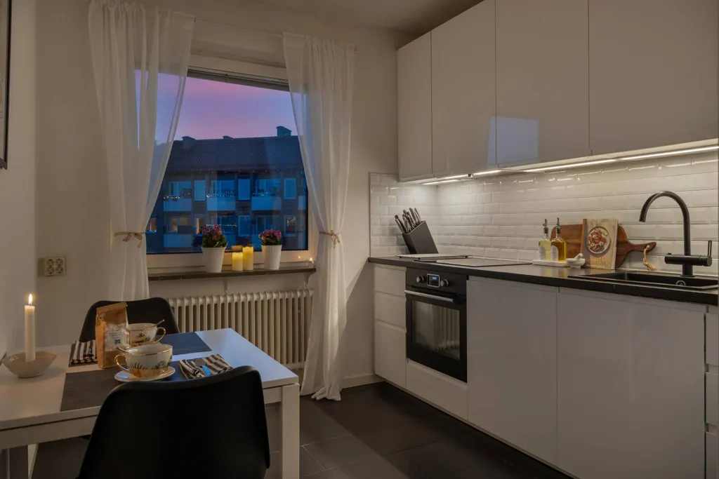 Kitchen - Modern Two-Bedroom with South-Facing Balcony in Malmö