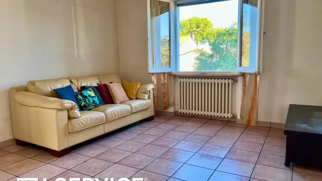 Séjour - Three-Bedroom Apartment with Balcony in Cervia
