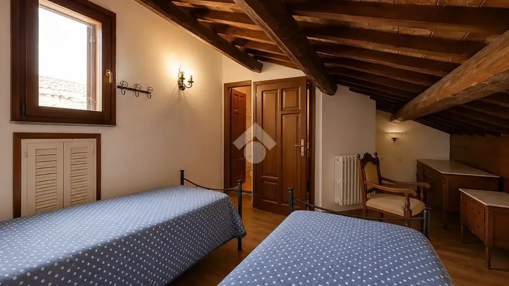 Camere da letto - Historic Apartments with Piazza View in Bagnaia