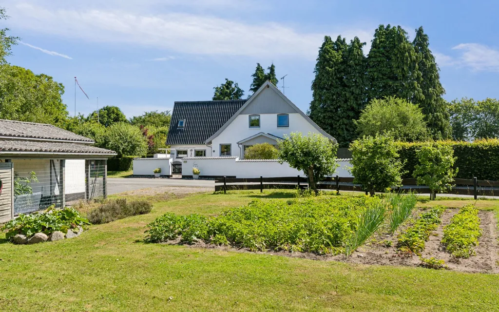 Jardin - Maison 4 pièces à Oure