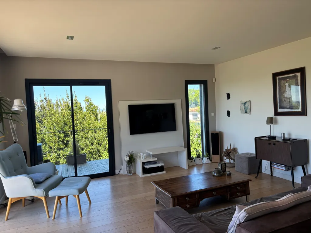 Living Room - Contemporary House with Panoramic View in Green Setting