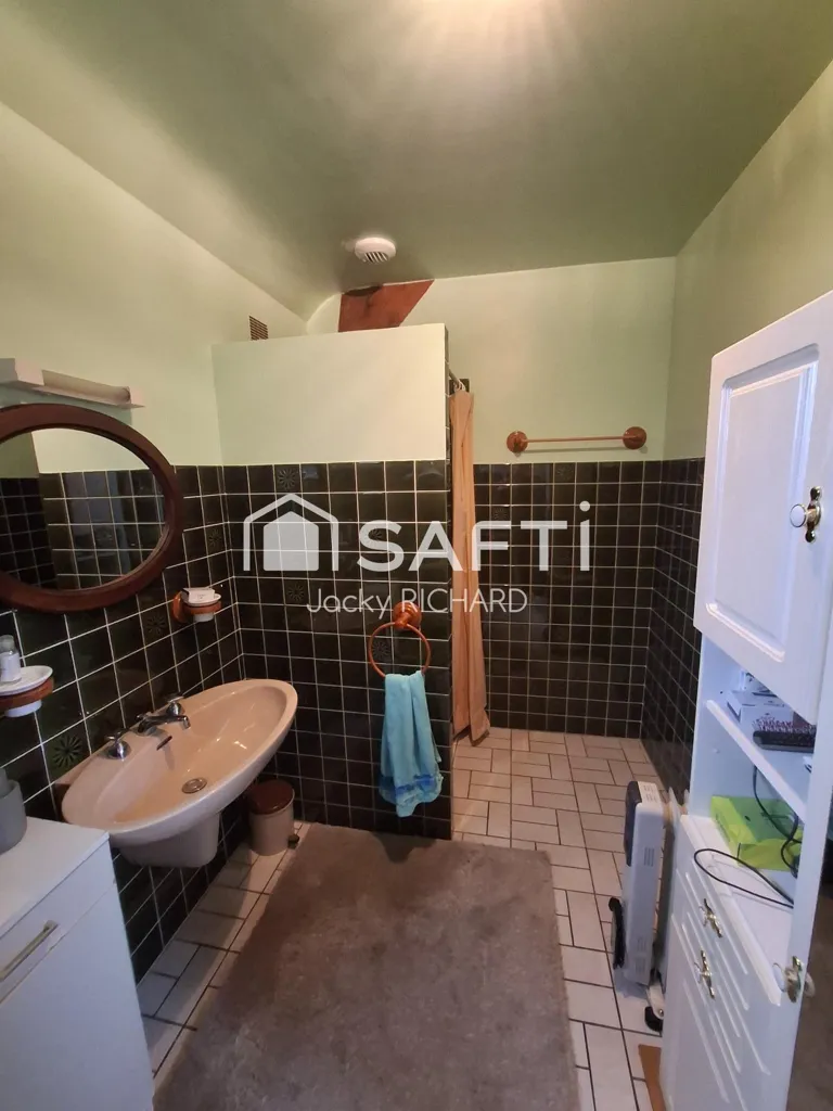 Salles de bain - Maison avec Jardin dans le Calme à Doulcon