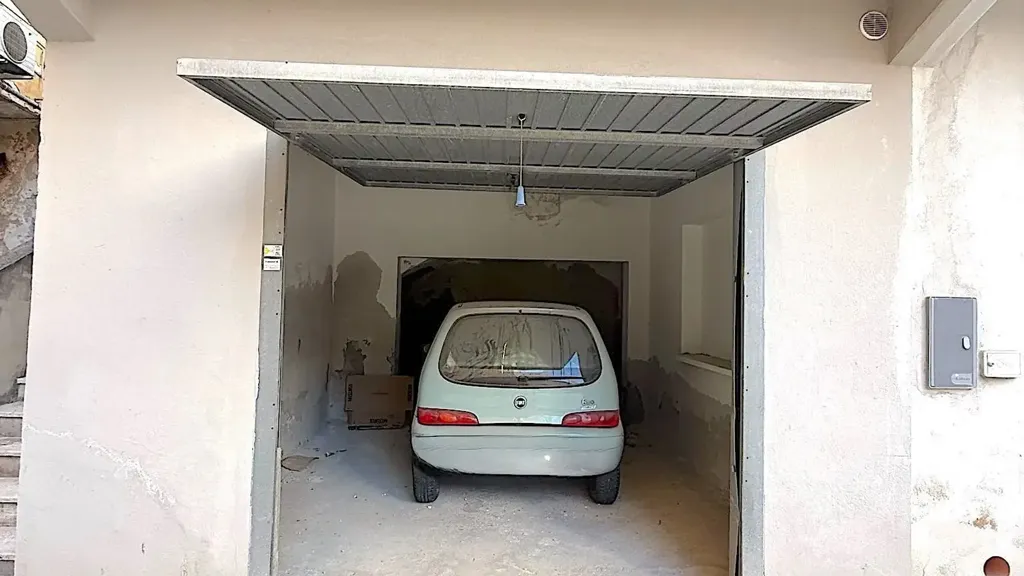 Garage - Modernised Apartment with Balcony in Cagliari