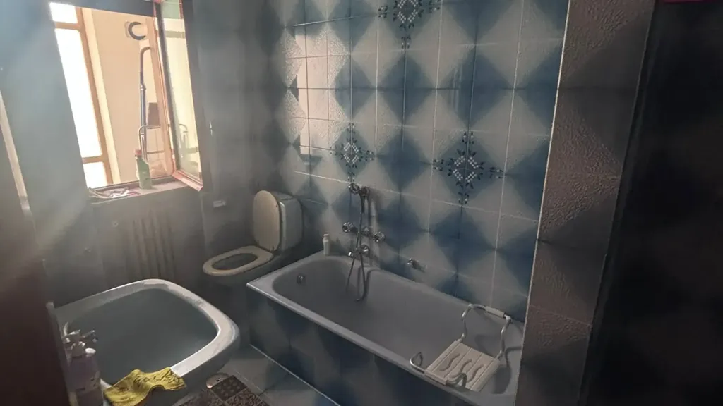 Salles de bain - Three-Bedroom Apartment with Balconies in Cosenza