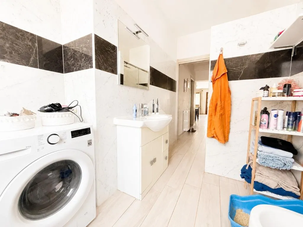 Bathrooms - Modernised Two-Bedroom in Palazzo Pignano