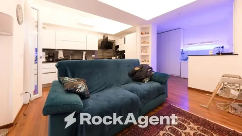 Living Room - Penthouse Apartment with Balcony in Genoa