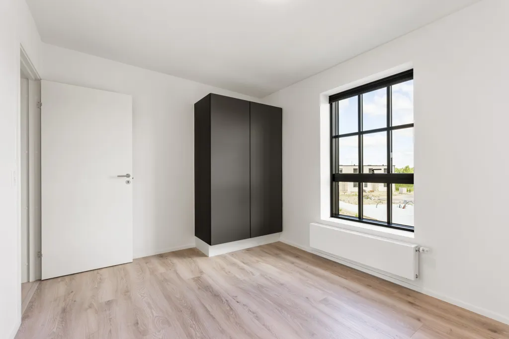 Toad - Modern Rowhouse with South-Facing Garden in Paderup