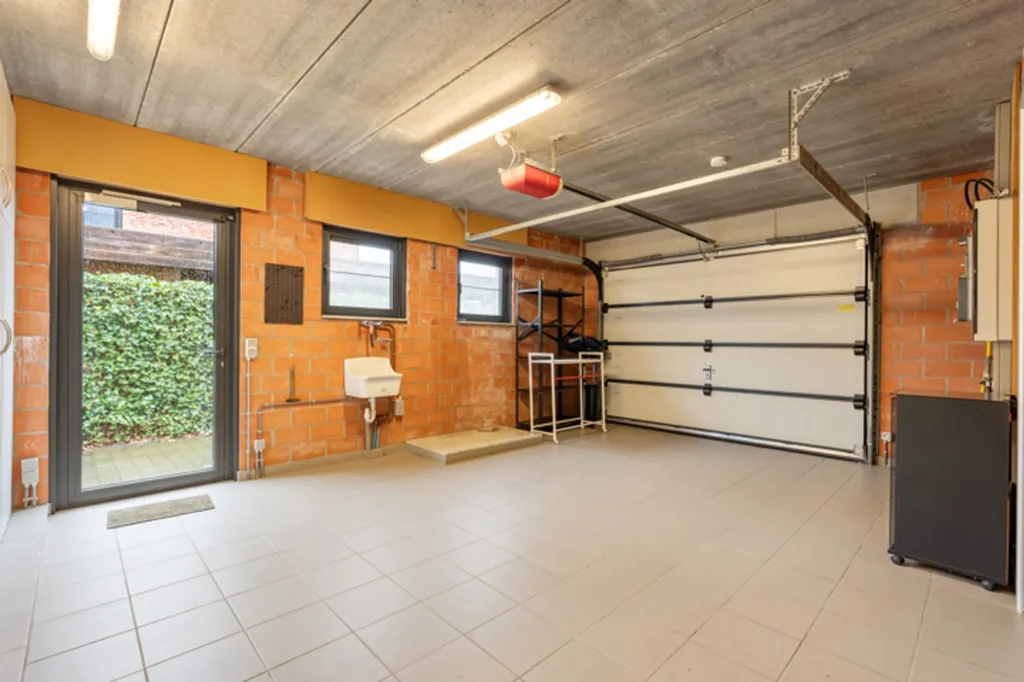 Garage - Architectural U-Form Villa with Garden in Geel