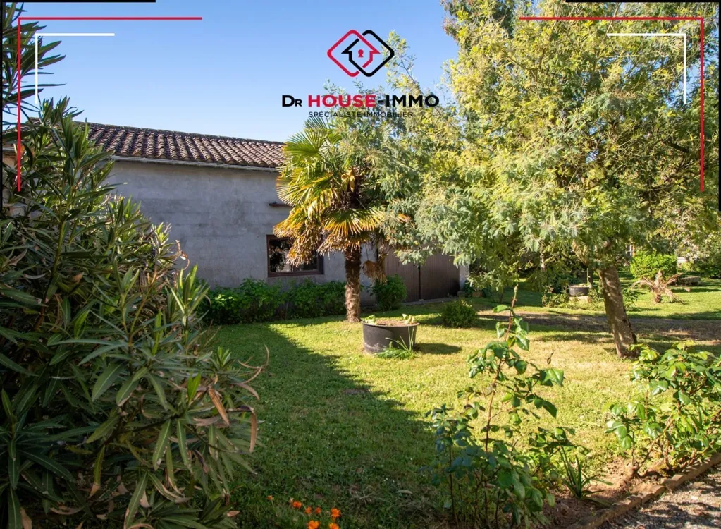 Jardin - Maison avec Jardin et Garage à Nalliers