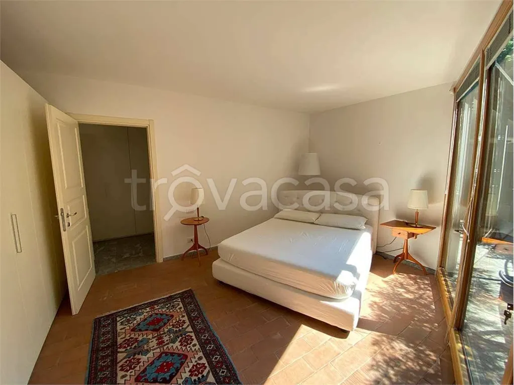 Camere da letto - Appartamento con vista lago e giardino a Faggeto Lario