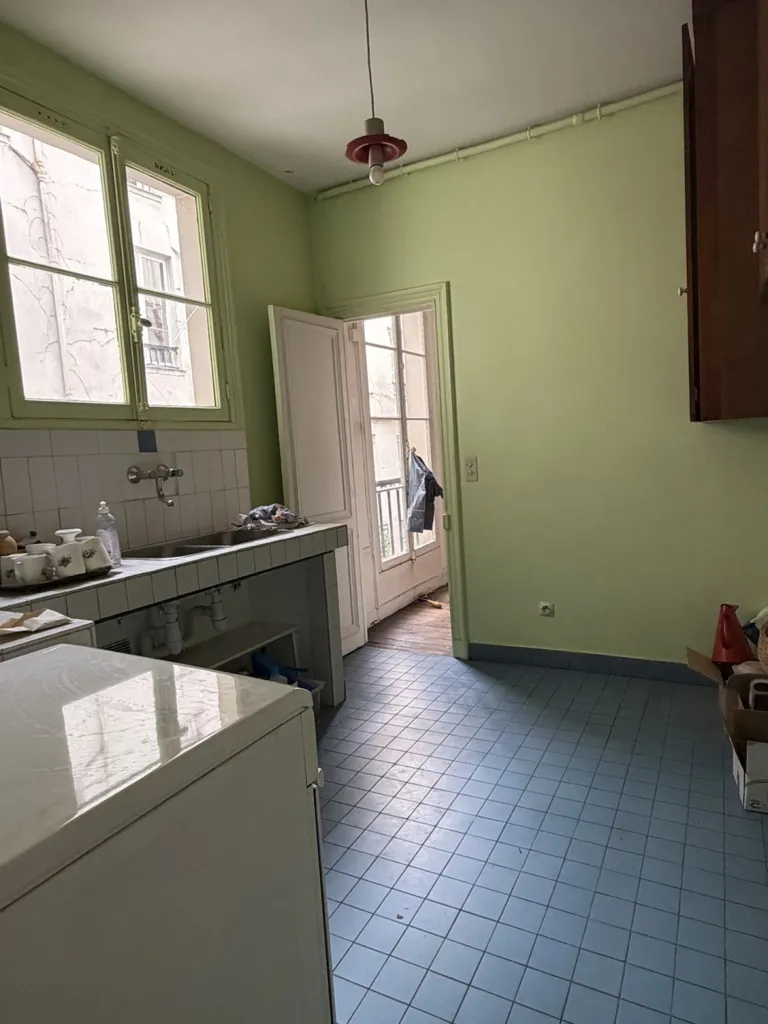 Köök - Characterful Flat with South View in Paris