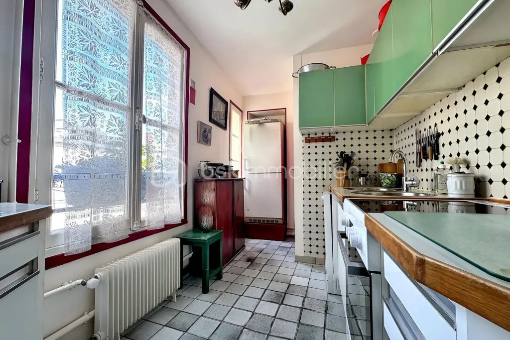 Cuisine - Appartement Luxe avec Triple Exposition à Paris