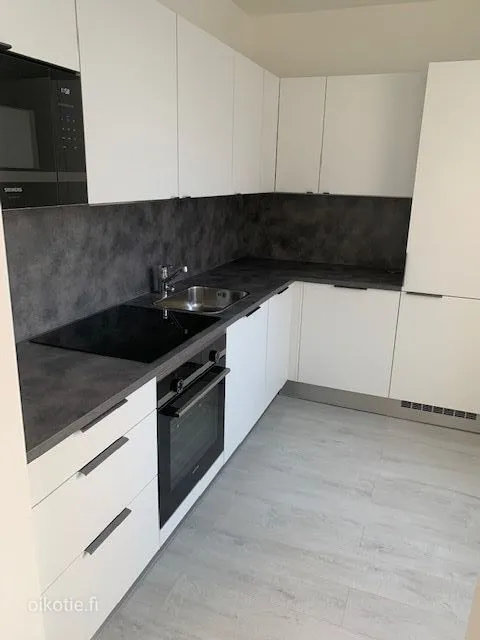 Cuisine - Modernised Apartment with Balcony in Mellunkylä