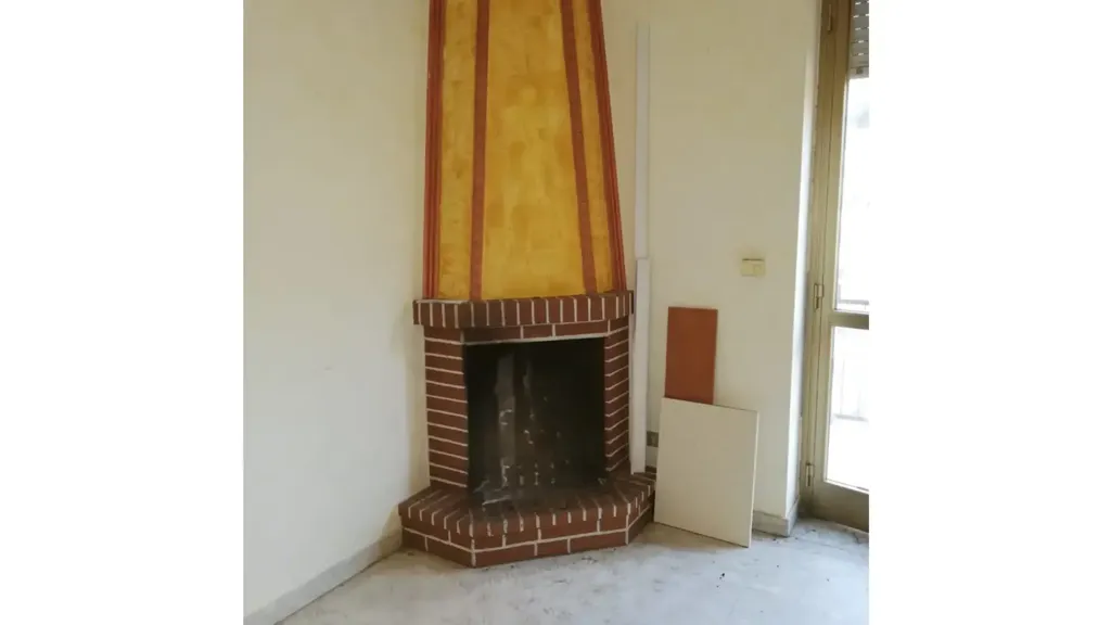 Living Room - Rustic Bilocale with Fireplace in Luzzi