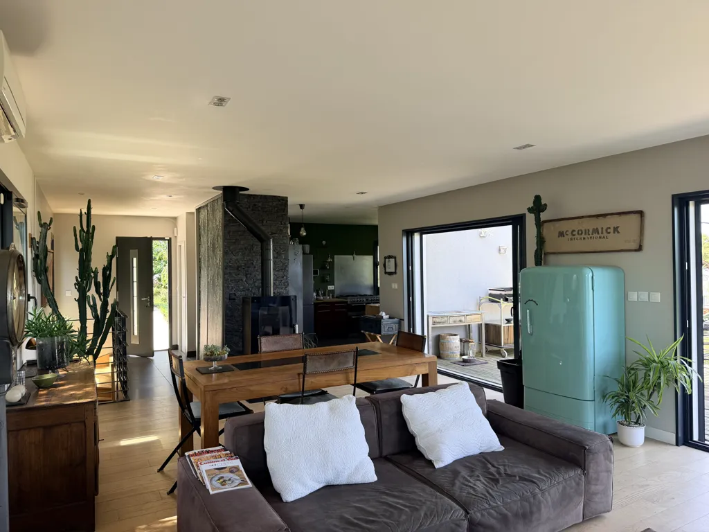 Living Room - Contemporary House with Panoramic View in Green Setting