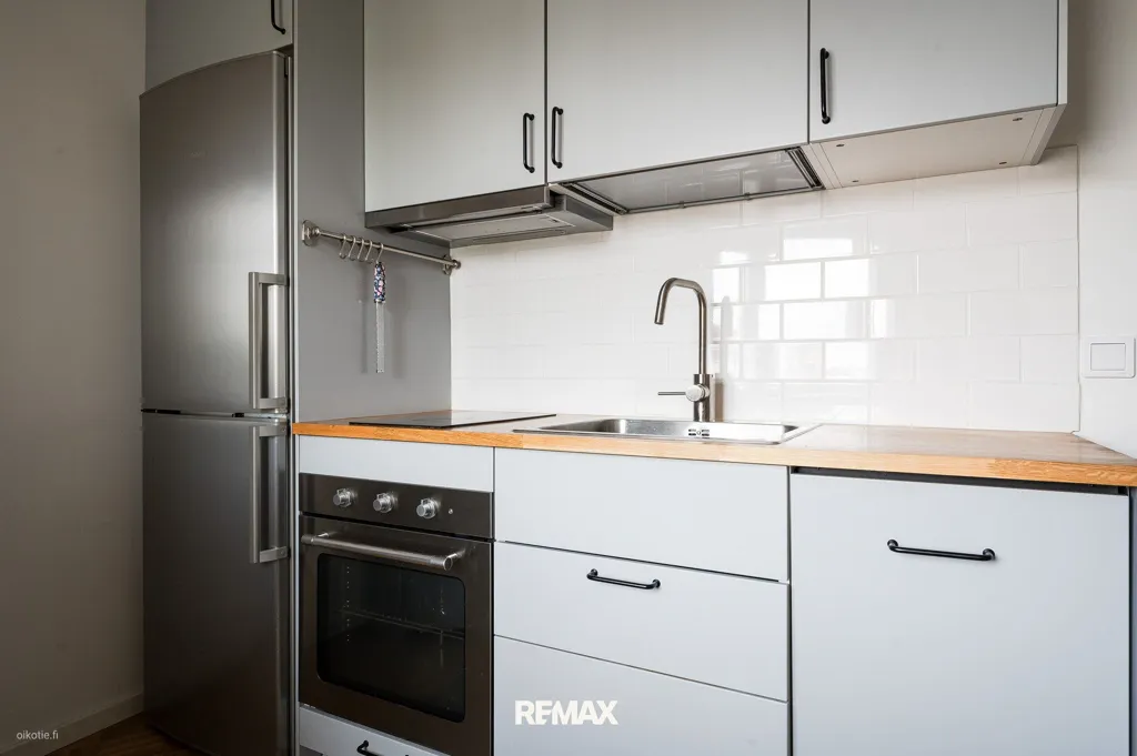 Cuisine - Bright Apartment with Balcony in Central Lahti