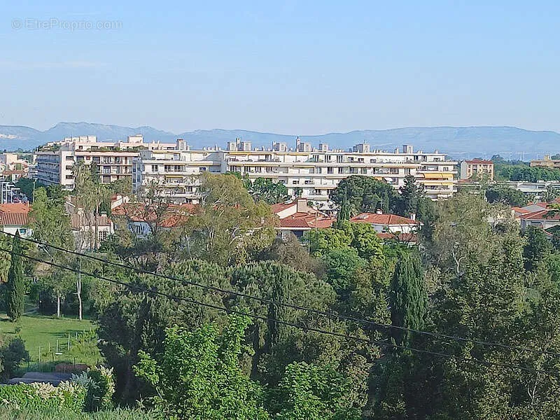 Appartement T4 avec Balcons et Vue Jardins à Perpignan