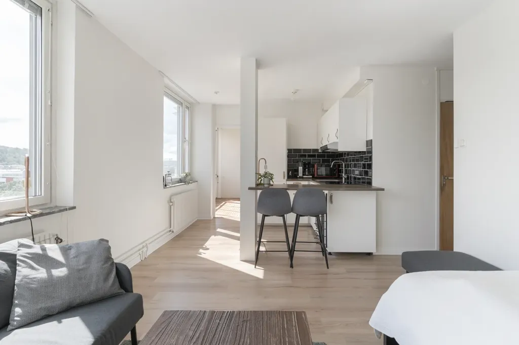 Séjour - Charming Penthouse with Balcony in Göteborg
