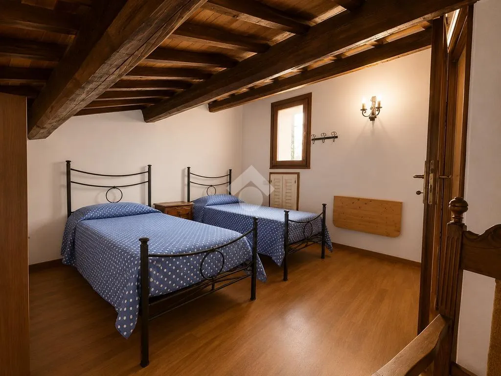 Camere da letto - Historic Apartments with Piazza View in Bagnaia