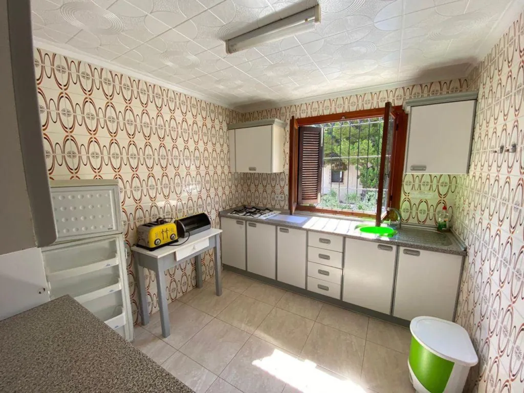 Köök - Renovated House with Two Pools in Punta Prima