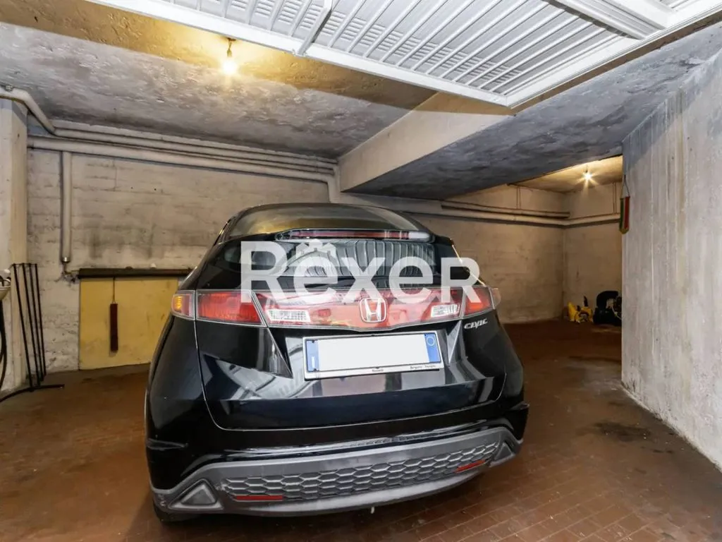 Garage - Luxury Penthouse with Terraces in Bergamo