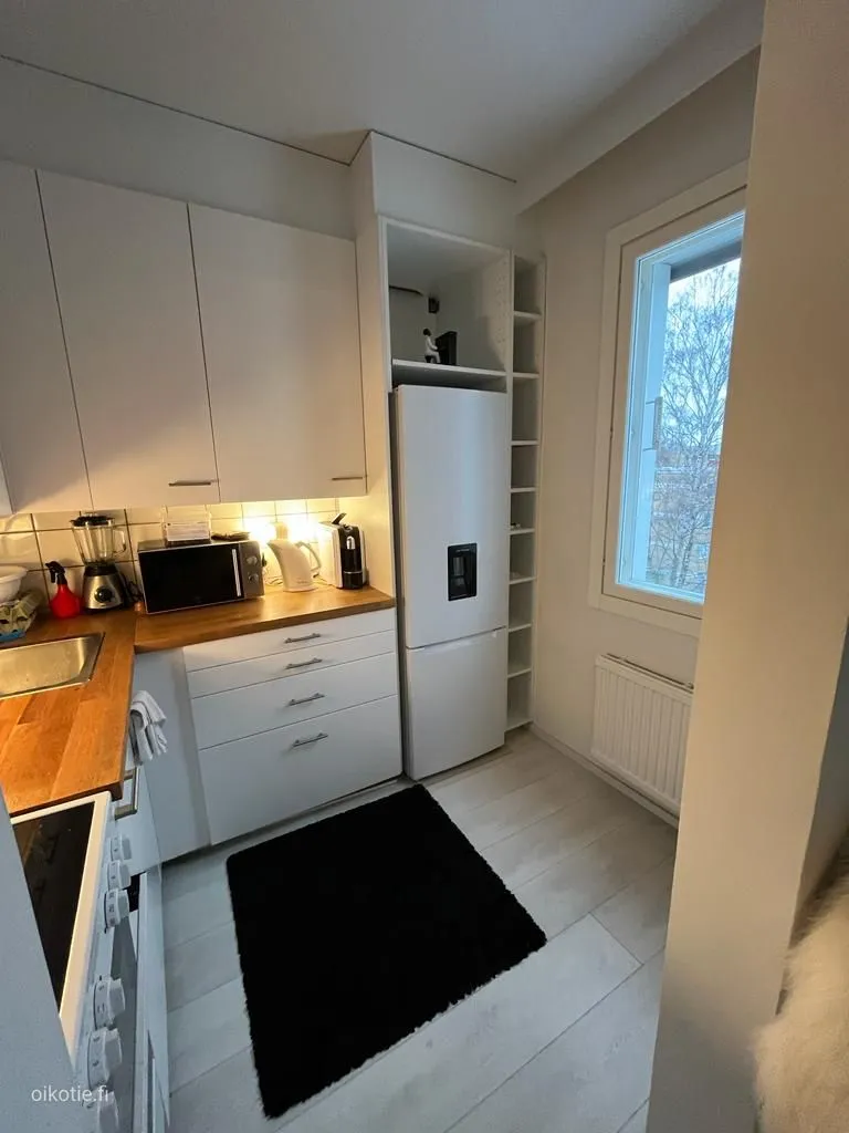 Kitchen - Studio Apartment with Metro Access in Vantaa