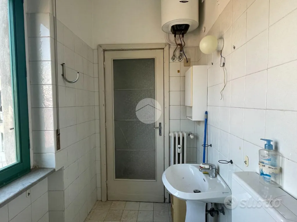 Bagni - Triplex with Balcony in Asti's Historic Centre