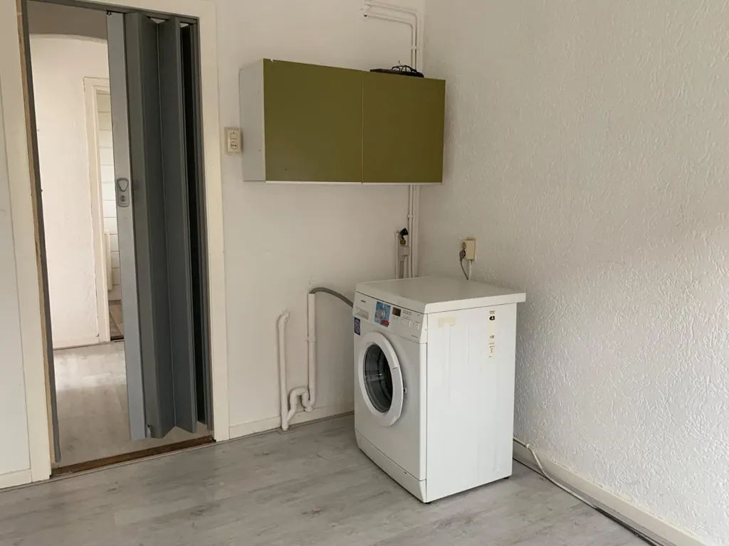 Hauswirtschaftsraum - 4-Bedroom Apartment with Garden in Enschede