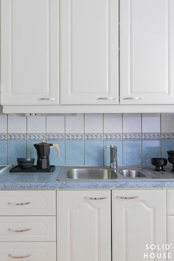 Kitchen - Spacious Apartment with Balcony in Laitila