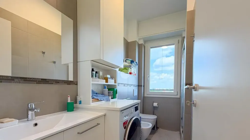 Bathrooms - Rearranged Two-Bedroom in Milan