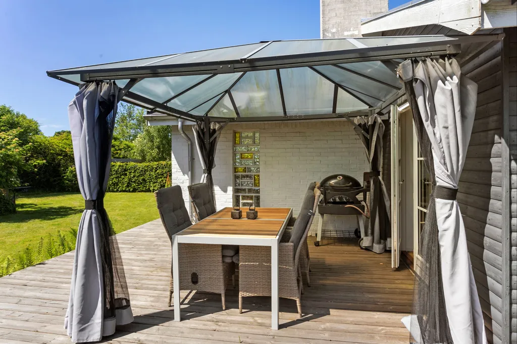 Terrasse - Summerhouse with Garden in Bogense