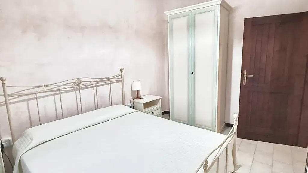 Bedrooms - Rustic Apartment with Private Garden in Pula