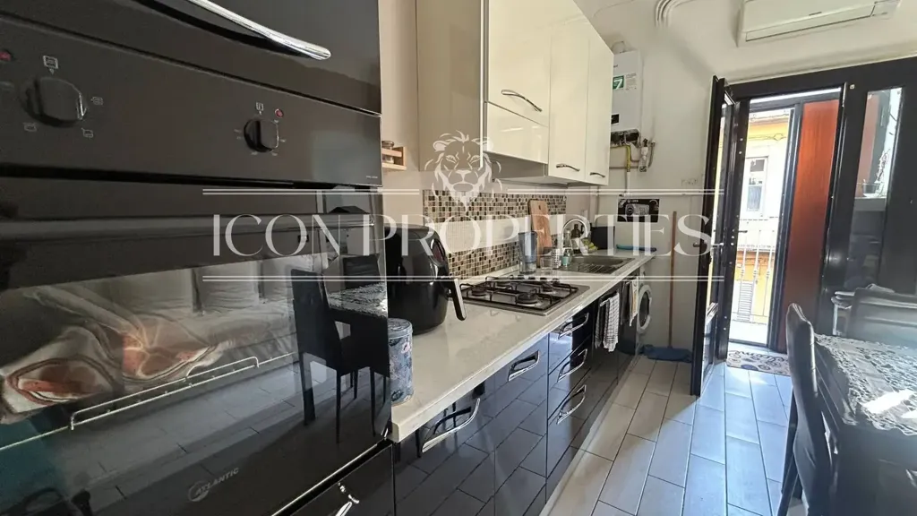 Kitchen - Bright 2-Bedroom Apartment in Milan's Isola