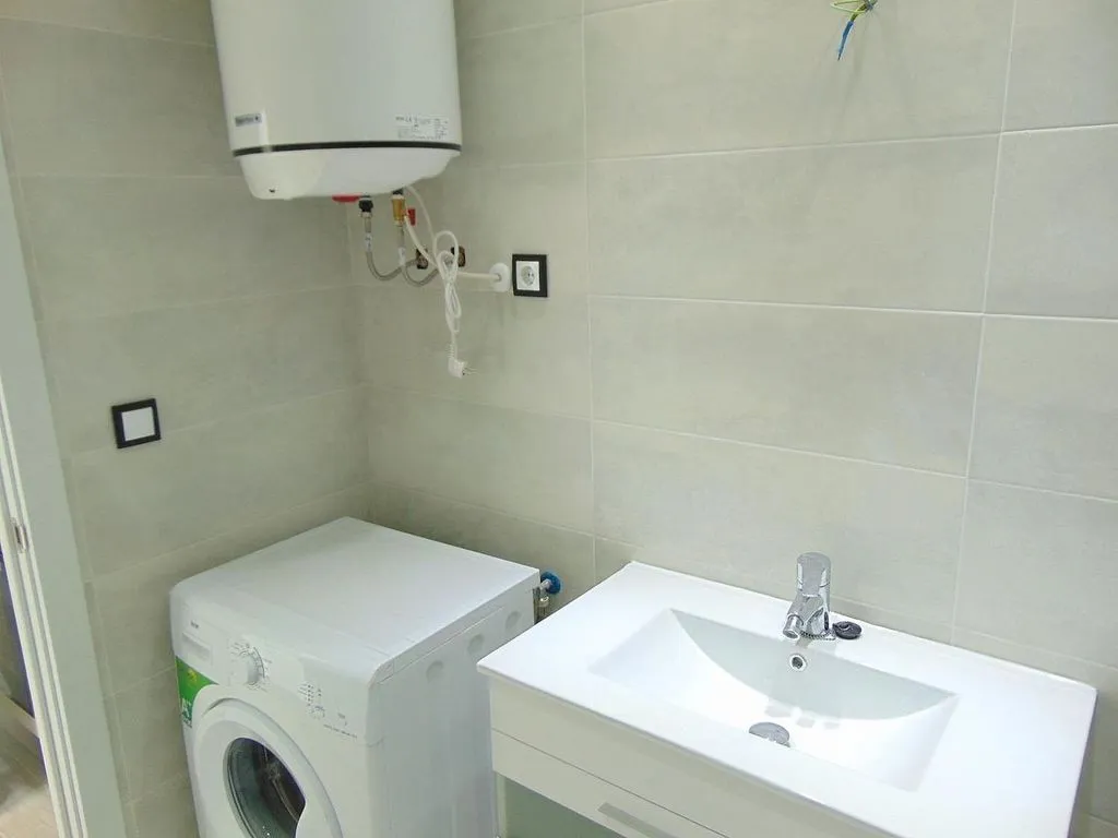 Pesuköök - Rental-Ready Chalet with Air Conditioning in Del Tajuña