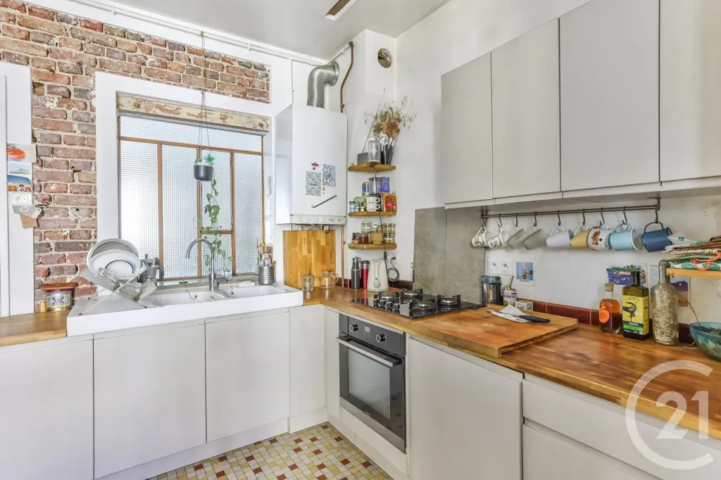 Cuisine - Appartement 2 Pièces avec Jardin à Aubervilliers