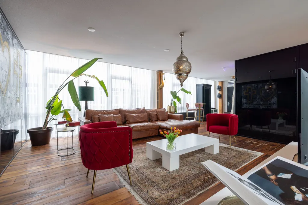Living Room - High-End Industrial Loft with Skyline View in Rotterdam