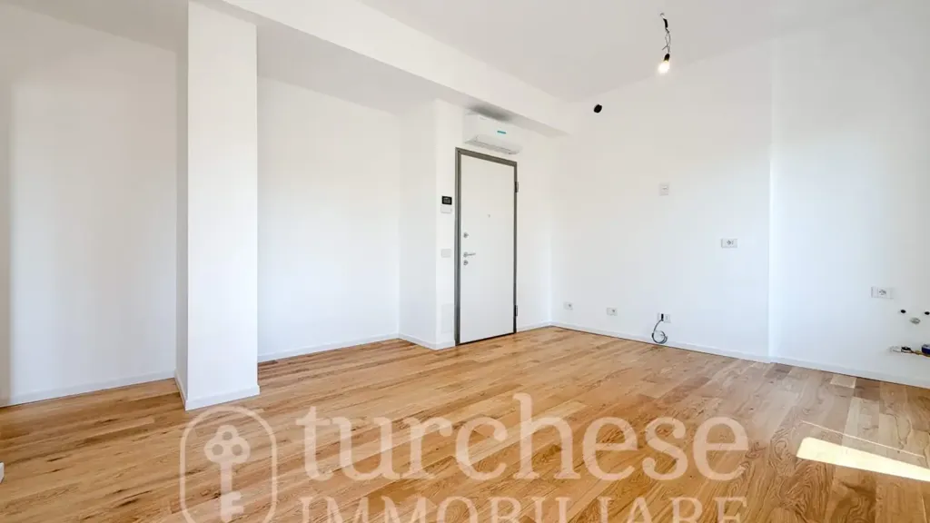 Living Room - Modernised Two-Bedroom Apartment in Bergamo