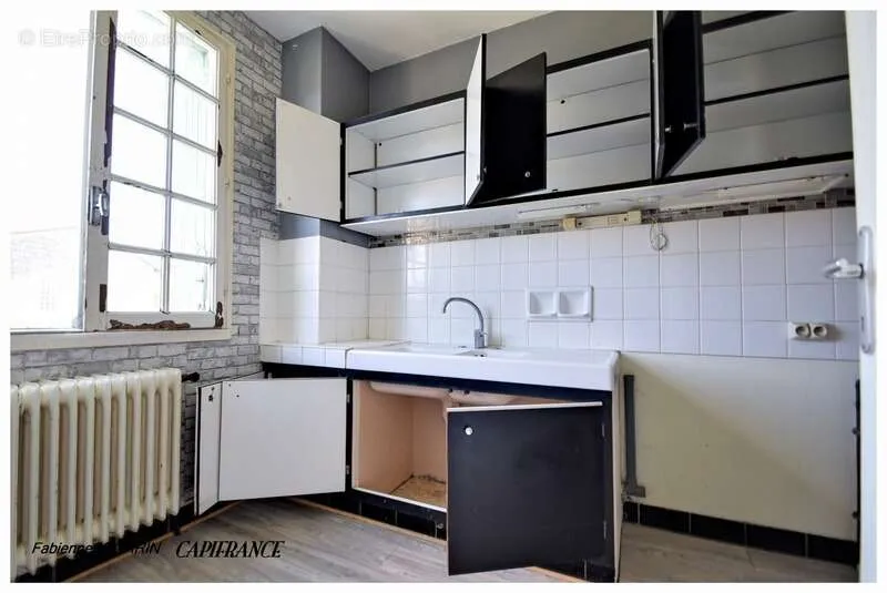 Kitchen - Spacious House with Large Garage in Aigondigné