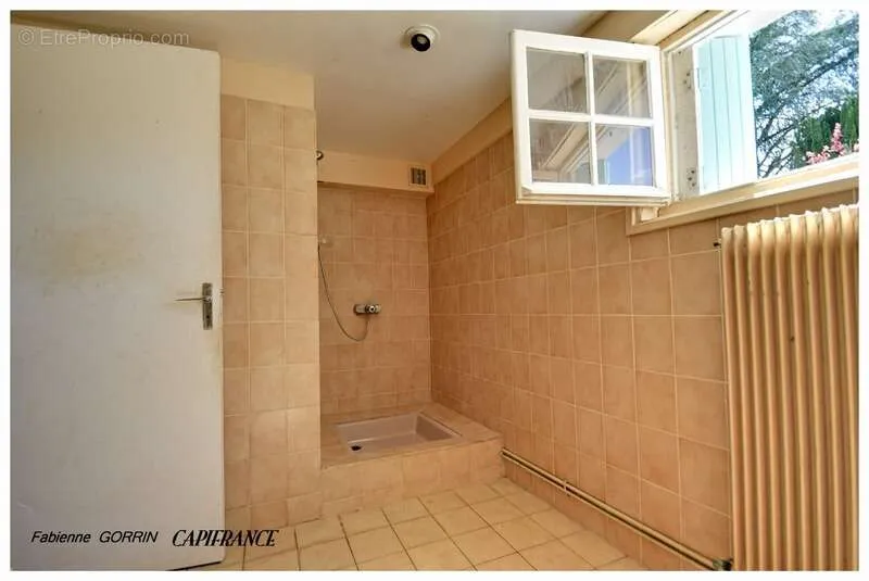 Bathrooms - Spacious House with Large Garage in Aigondigné
